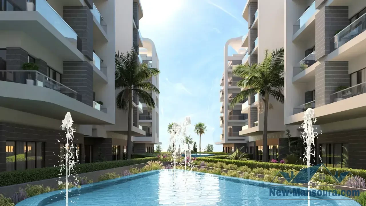 For sale in New Mansoura, a first row apartment on the sea in The Pearl Compound, 175m